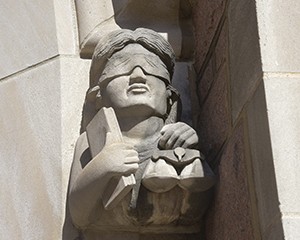 Lady justice gargoyle from Anheuser Busch Hall